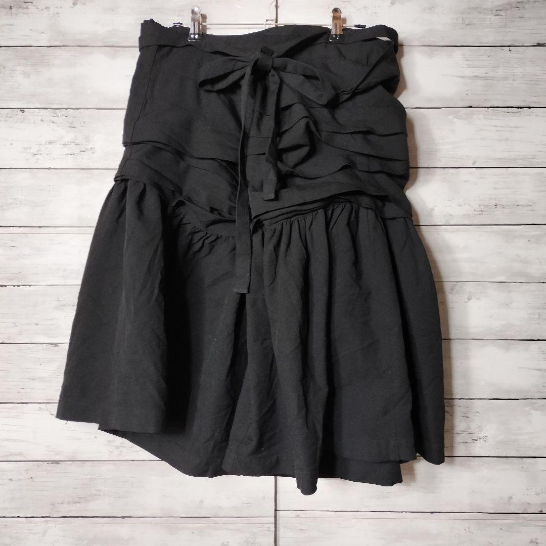 コムコム コムデギャルソン ポリエステル縮絨 巻きスカート ひざ丈 フリル