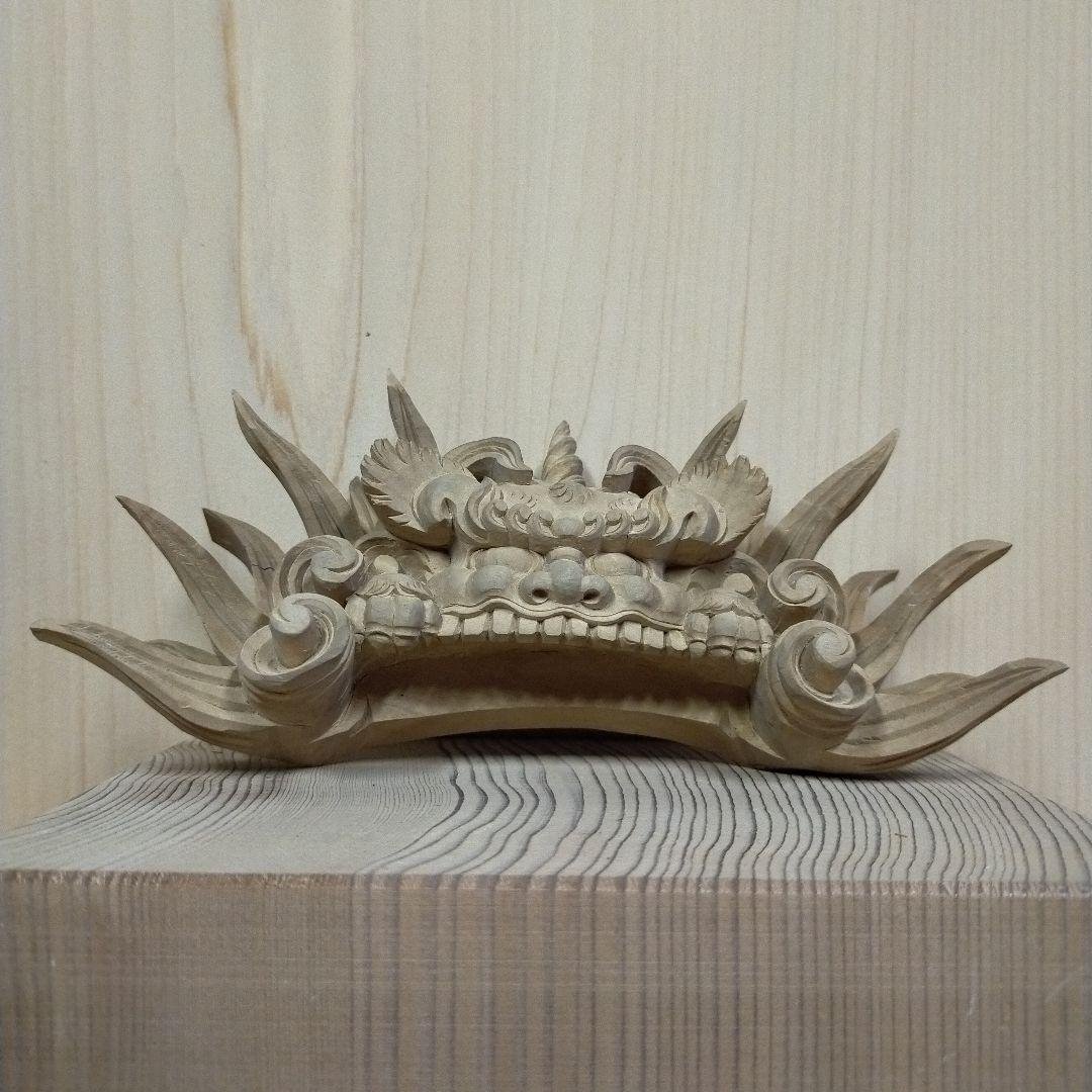 獅噛み白檀彫刻